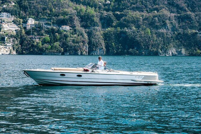 1 Hour Private and Guided Cruise on Lake Como by motorboat - The breakwater and Life Electric: a modern landmark on an old shoreline