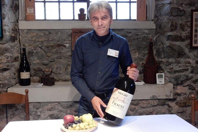 Wine and Food tasting PRIVATE Guided Tour - Stop 2 in Chiuro: One or Two Wineries, Guided Visits, and 3+ Glasses with Local Food